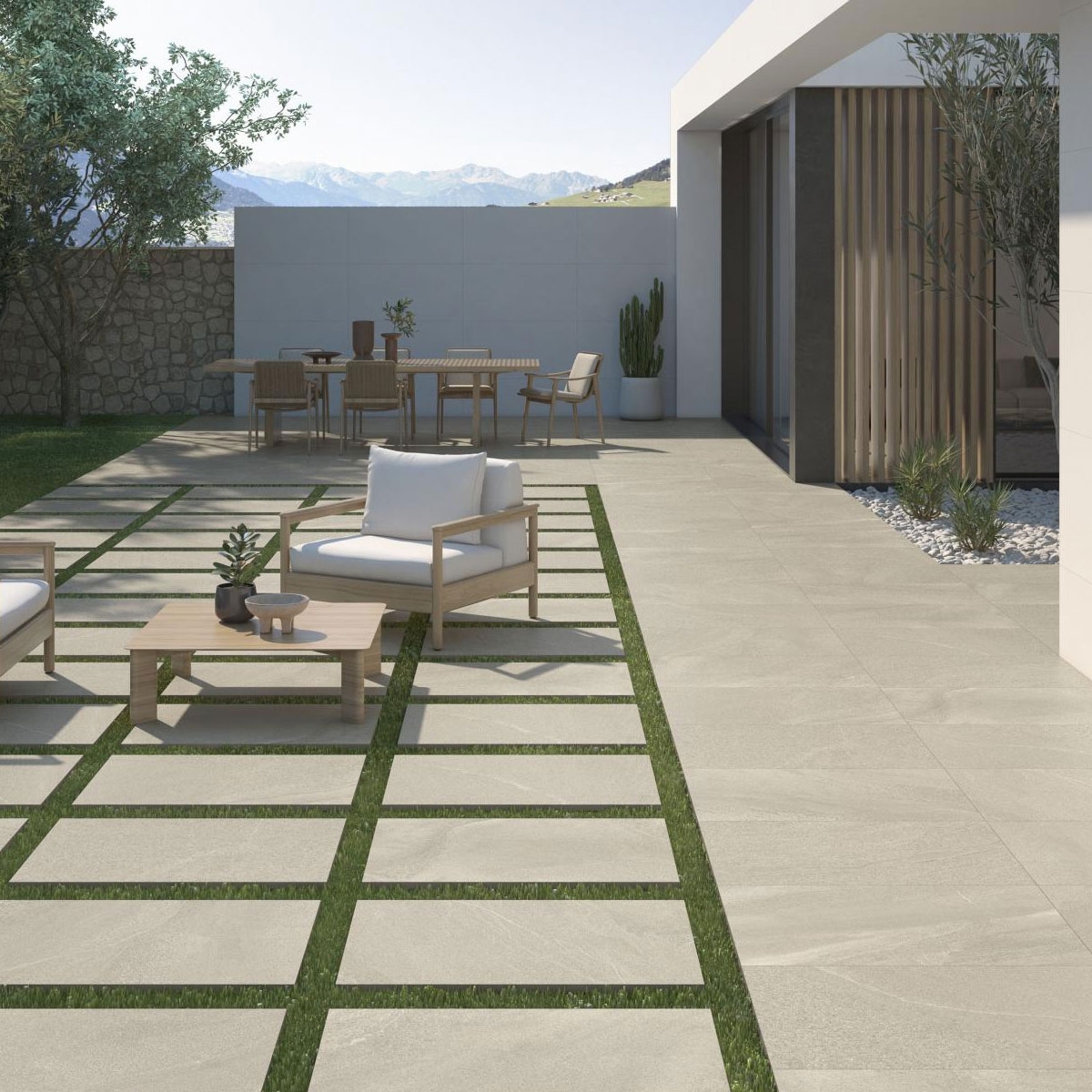 Exterior con pavimento AT Burlingstone Marfil 60x120