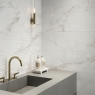 Baño con revestimiento Firenze Wavy White 25x50