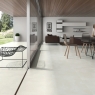Interior y exterior con pavimento Olimpo Bone 60x60