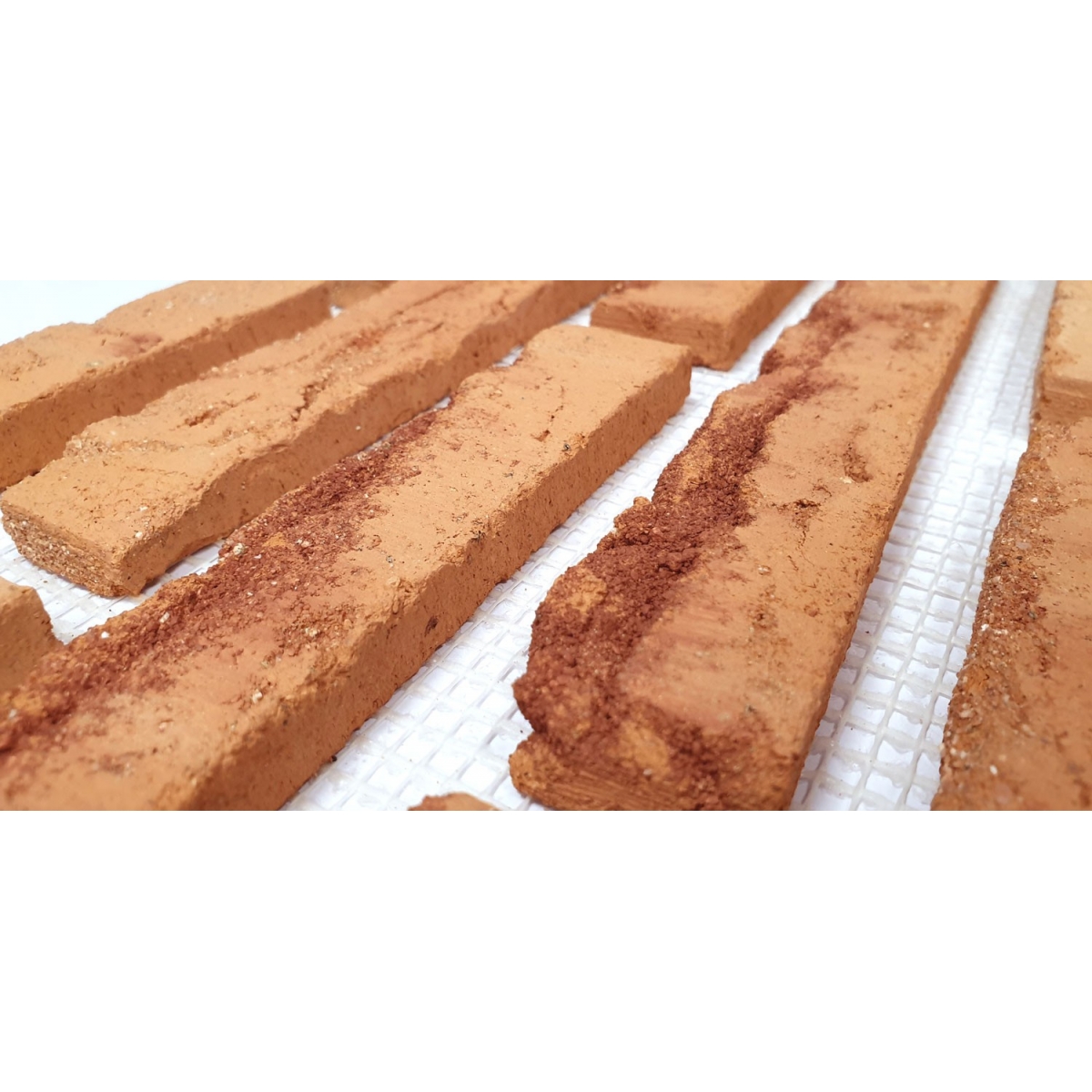 Mesh brick tile for interior and exterior cladding in salmon color