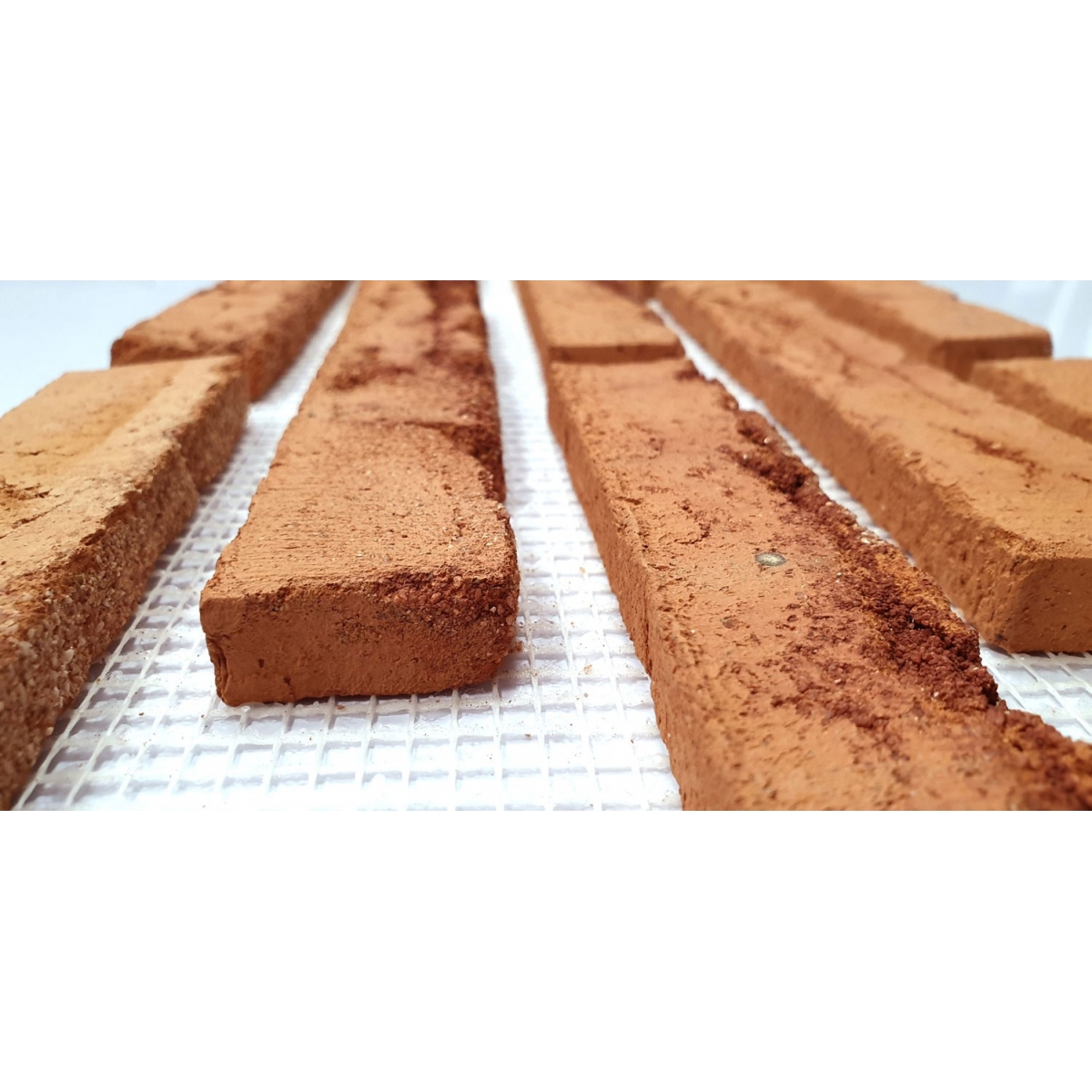 Sanded salmon manual tile (m2) 0