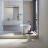 Baño con revestimiento Q Terramar Bone 31x98
