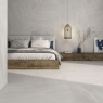 Dormitorio con Revestimiento y Pavimento Lavica Arena 120x120 cm