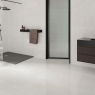 Baño con pavimento y revestimiento Rebel White Pulido 60x120