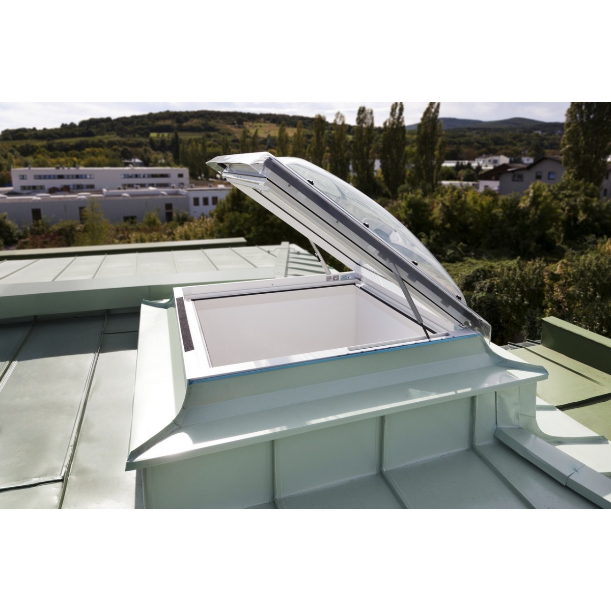 Window with exit to the roof for flat roof