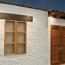 Cortijo cru com imitação de revestimento de pedra - Revenmientos Verniprens