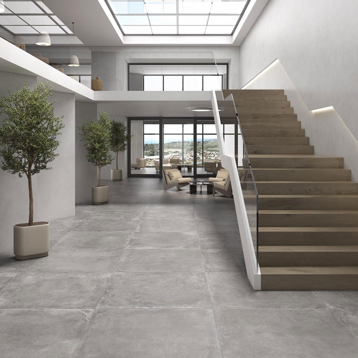 Interior con pavimento Midway Ash 90x90