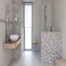 Bathroom with AT Kiel Relief Grey 33.3x55 cladding
