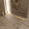 Intérieur avec kit de caniveau de douche Revolux Tryphon Curve Gold 100 cm