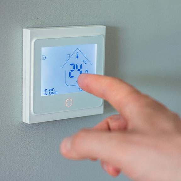 adjust the heating thermostat