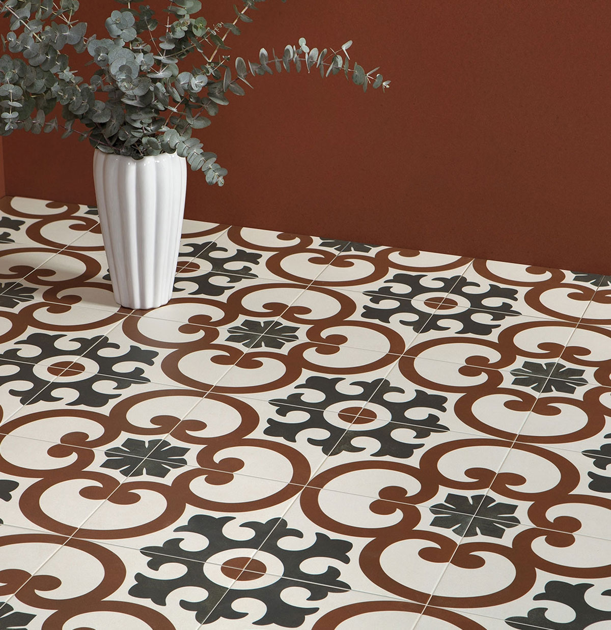 Pavimento hidráulico rojo en una habitación